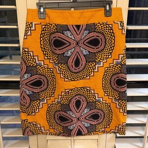 Anthropologie Orange and Black Patterned Pencil Skirt